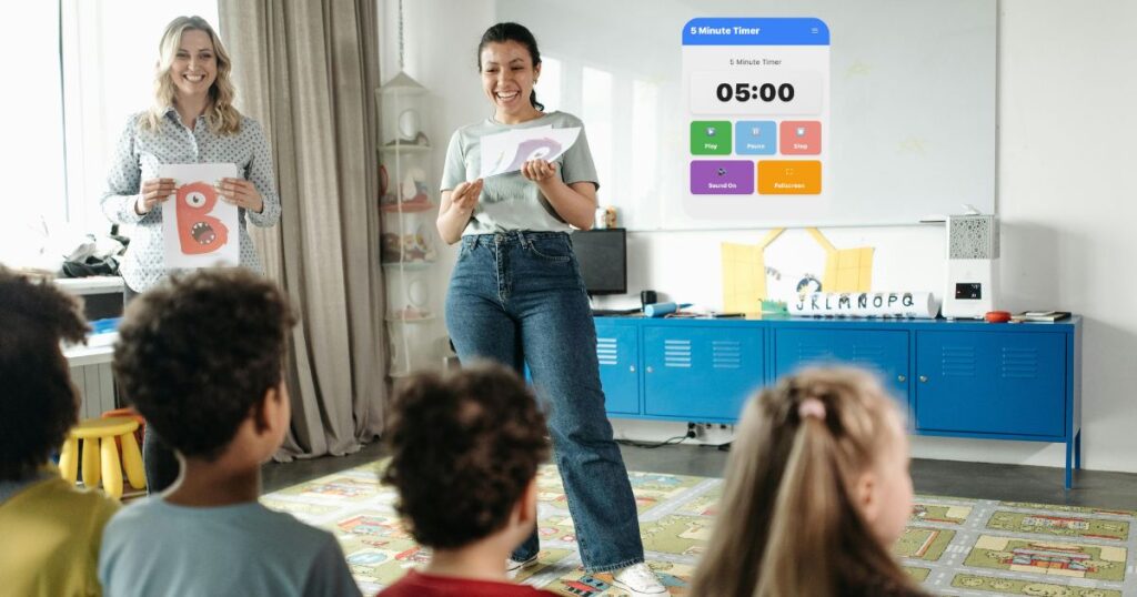 Students preparing for the next lesson with a 5 minute timer online displayed in the classroom.