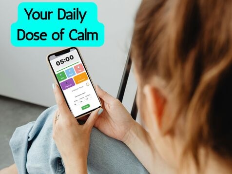 Close-up of meditation app screen displaying timer interface with calming background elements like soft lighting and nature sounds
