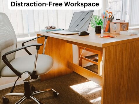 Clean minimalist desk setup with laptop, plant, and organizers showing distraction-free workspace for deep work sessions