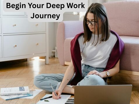Woman sitting on floor with laptop and papers beginning deep work practice session in calm organized workspace