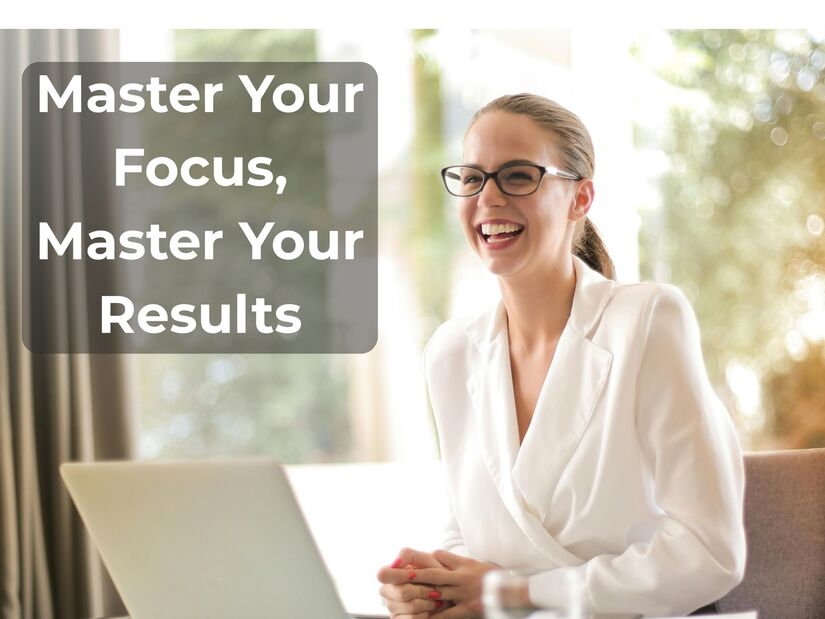 Satisfied professional woman smiling at laptop in bright natural light workspace showing achievement and success after mastering focus sessions and productivity strategies