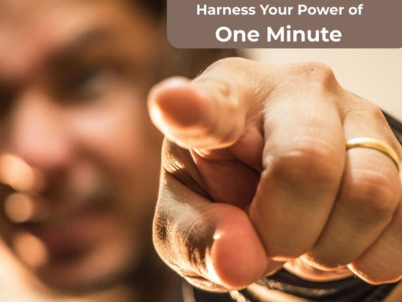 Man flexing arm representing strength and power of using 1 minute timer for productivity