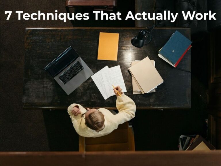 Professional organizing workspace with laptop and notebook for time management planning session