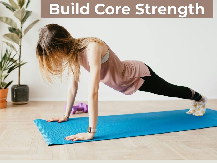 Person demonstrating proper plank form for core strength as part of beginner home workout routine showing correct alignment
