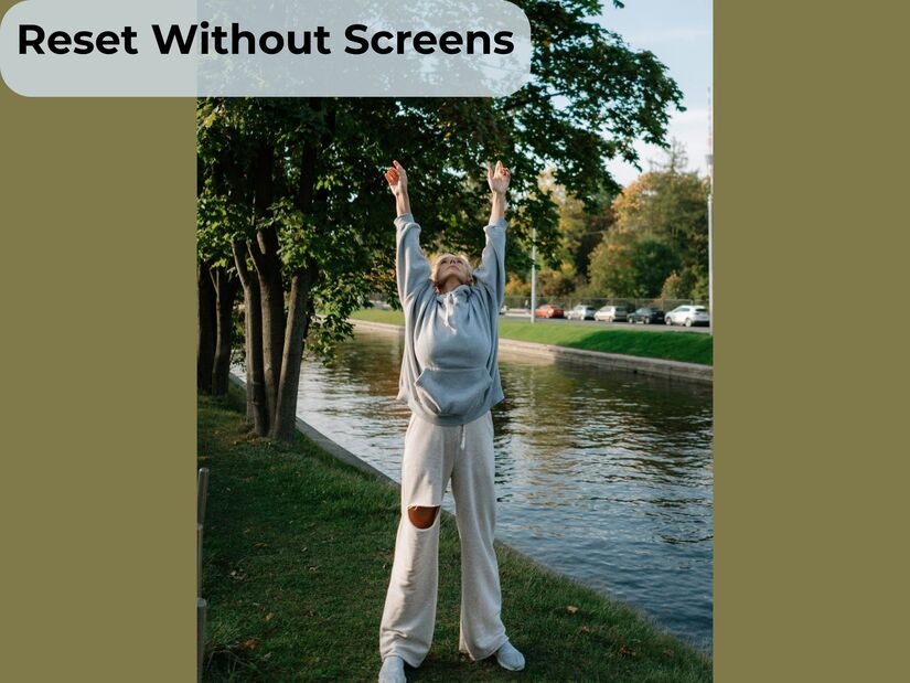 Person stretching outdoors during digital detox breaks, demonstrating phone-free mental reset routine ina natural environment