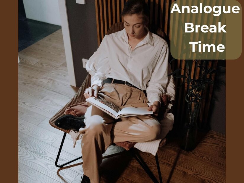 Person reading a physical book during a 25-minute digital detox break, showing screen-free relaxation routine for mental reset
