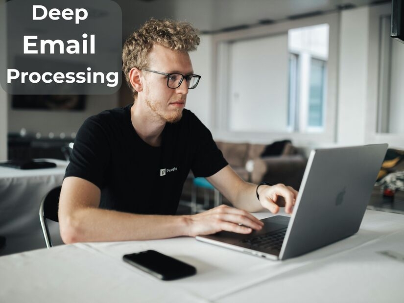 Person composing a complex email during a 25-minute email management routine deep session, showing focused professional communication

