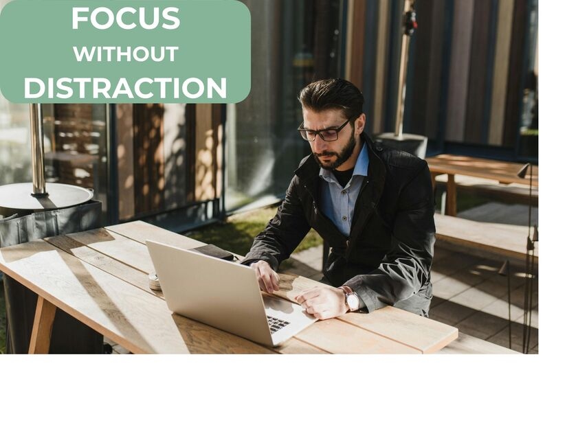 Professional showing how to improve focus and concentration at organized workspace with natural lighting and minimal distractions