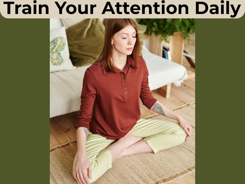 Person practising mindfulness meditation to improve focus and concentration through attention training exercises