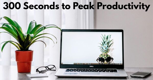 A minimalist desk with a 5 minute timer setup for professional focus.
