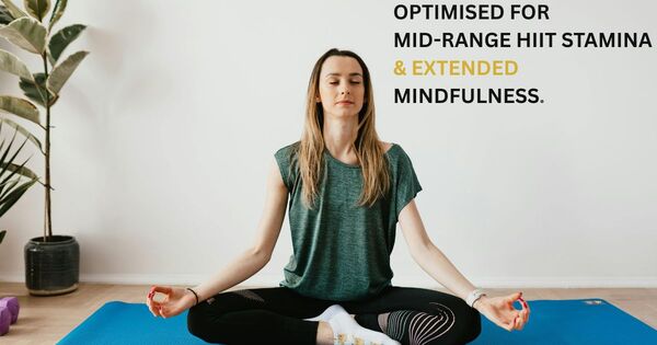 person practicing yoga meditation on a blue mat using a 13 minute timer for health protocols