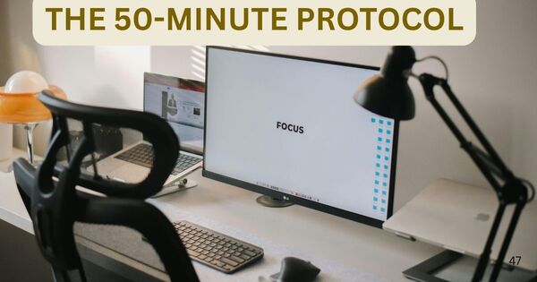 A clean, professional desk setup with a 50-minute timer, illustrating the 50-minute timer protocol for deep work and cognitive productivity