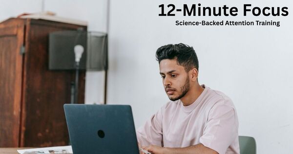 A professional working at a minimalist desk using a 12 minute timer to maintain focus and deep work