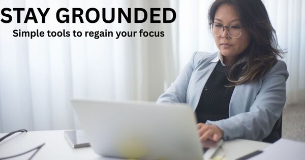 A person working at a clean, organized desk, illustrating how using a visual timer helps overcome time-blindness and task paralysis.