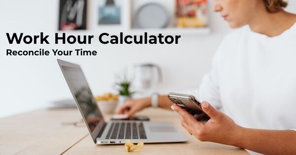 A professional person using a work hour calculator on a laptop at a wooden desk to reconcile time.